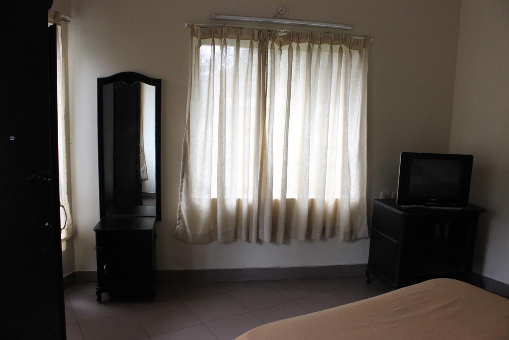 Albarad Hotel Munnar Quarto foto