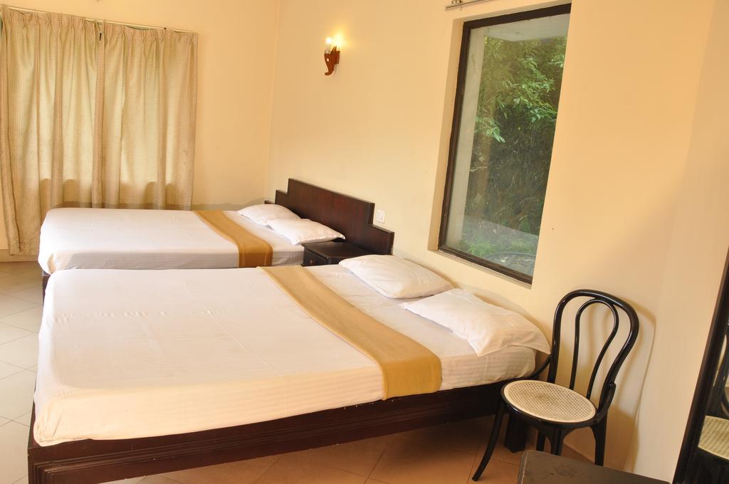 Albarad Hotel Munnar Quarto foto